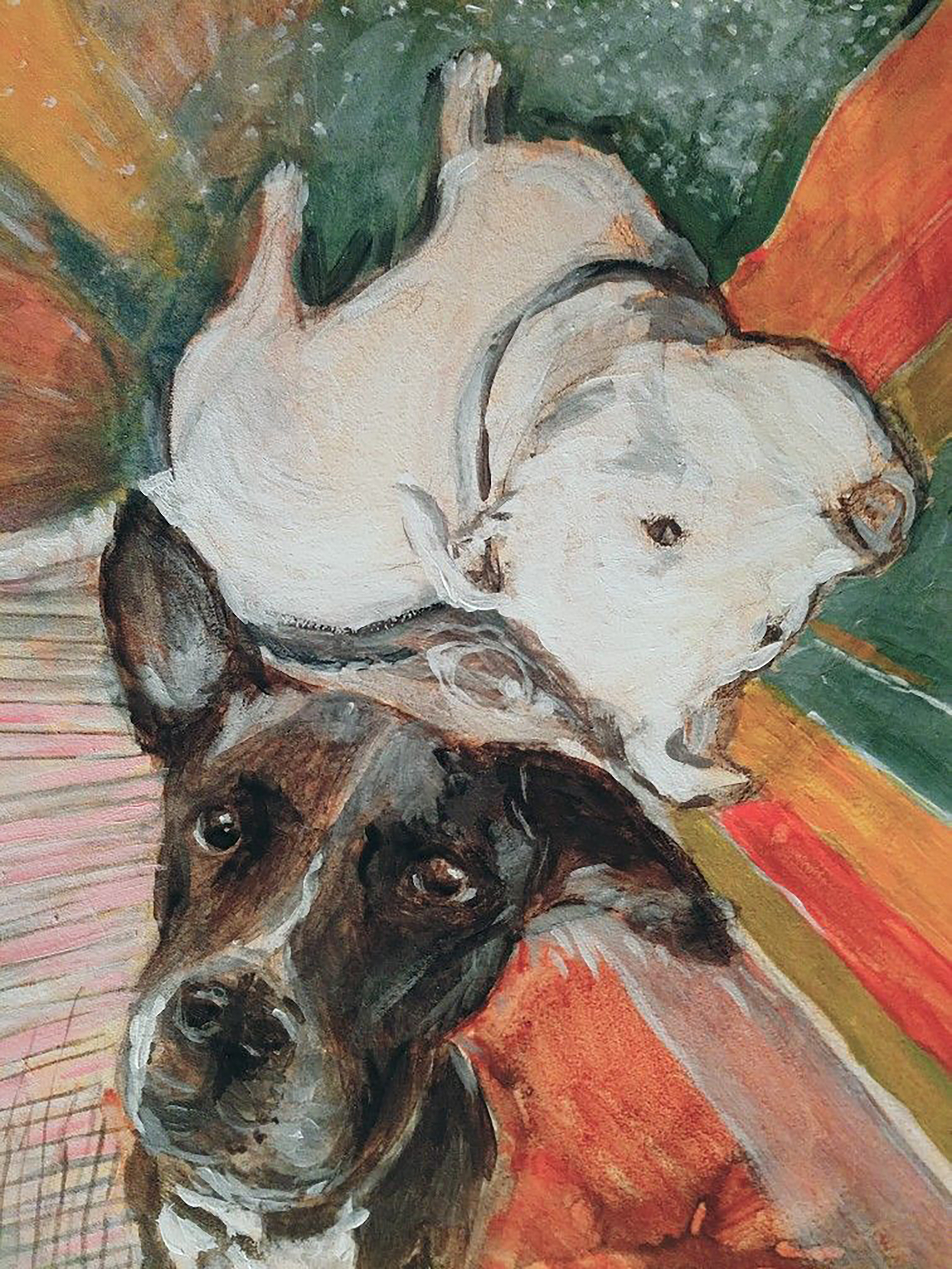 Two dogs on a colorful ground.